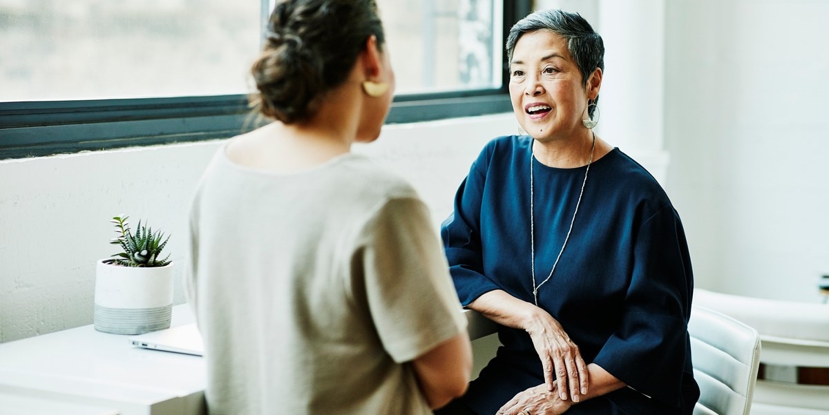 two women meeting in office